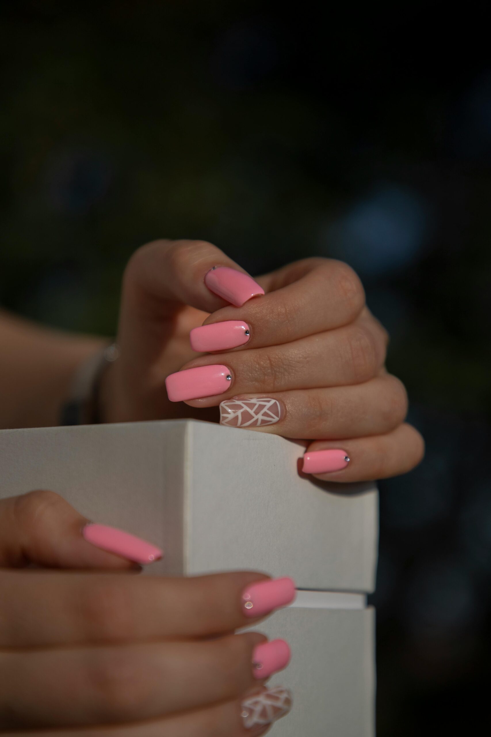 a featured image for a blog post about fun pink summer nails