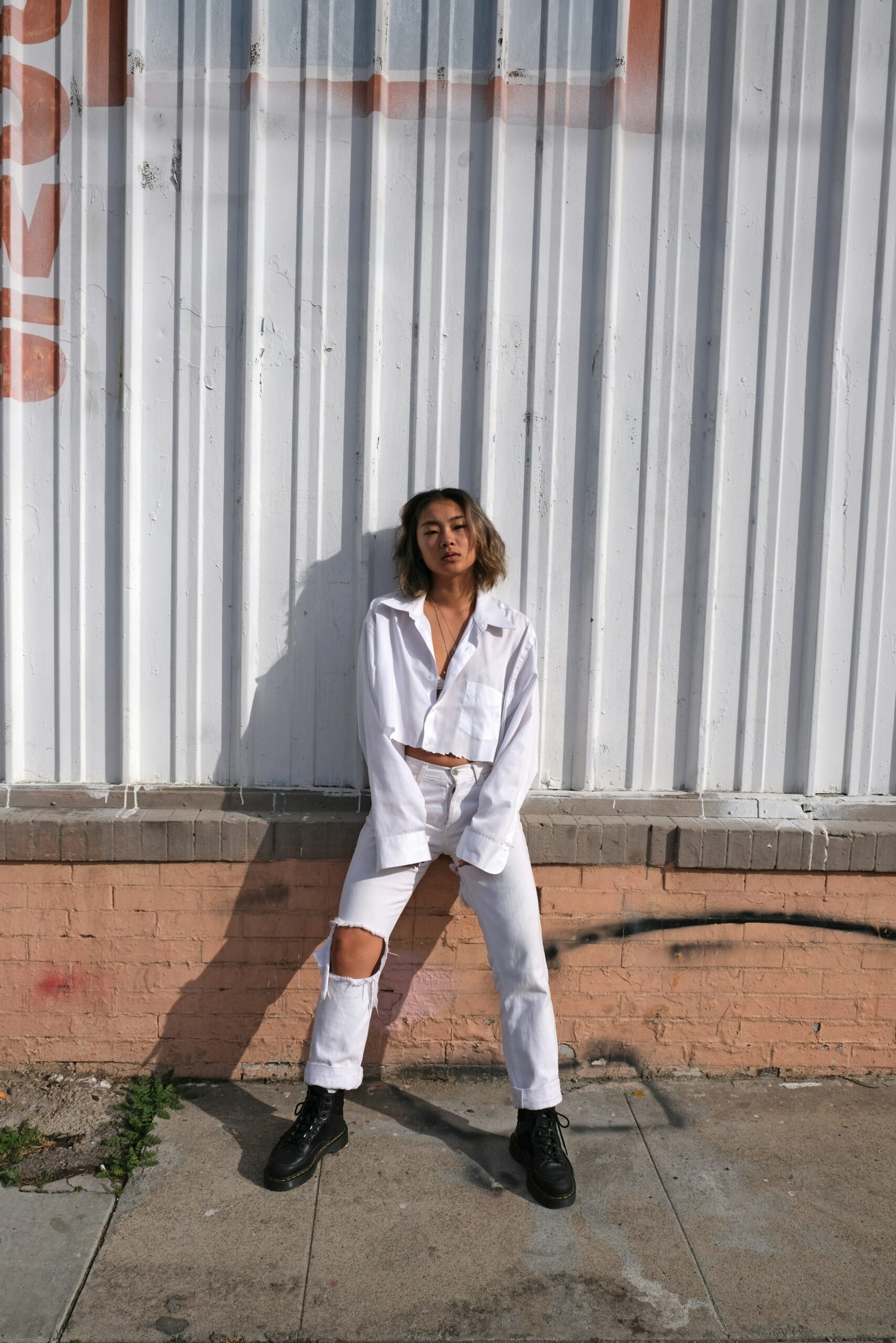 a pin that says in a large font common fashion mistakes that instantly age your look